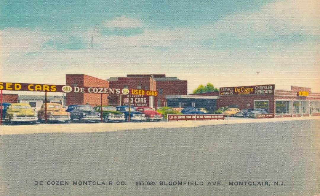 Vintage postcard of DeCozen Chrysler-Plymouth dealership at 665-683 Bloomfield Avenue Montclair NJ — the building Kush Connection now occupies