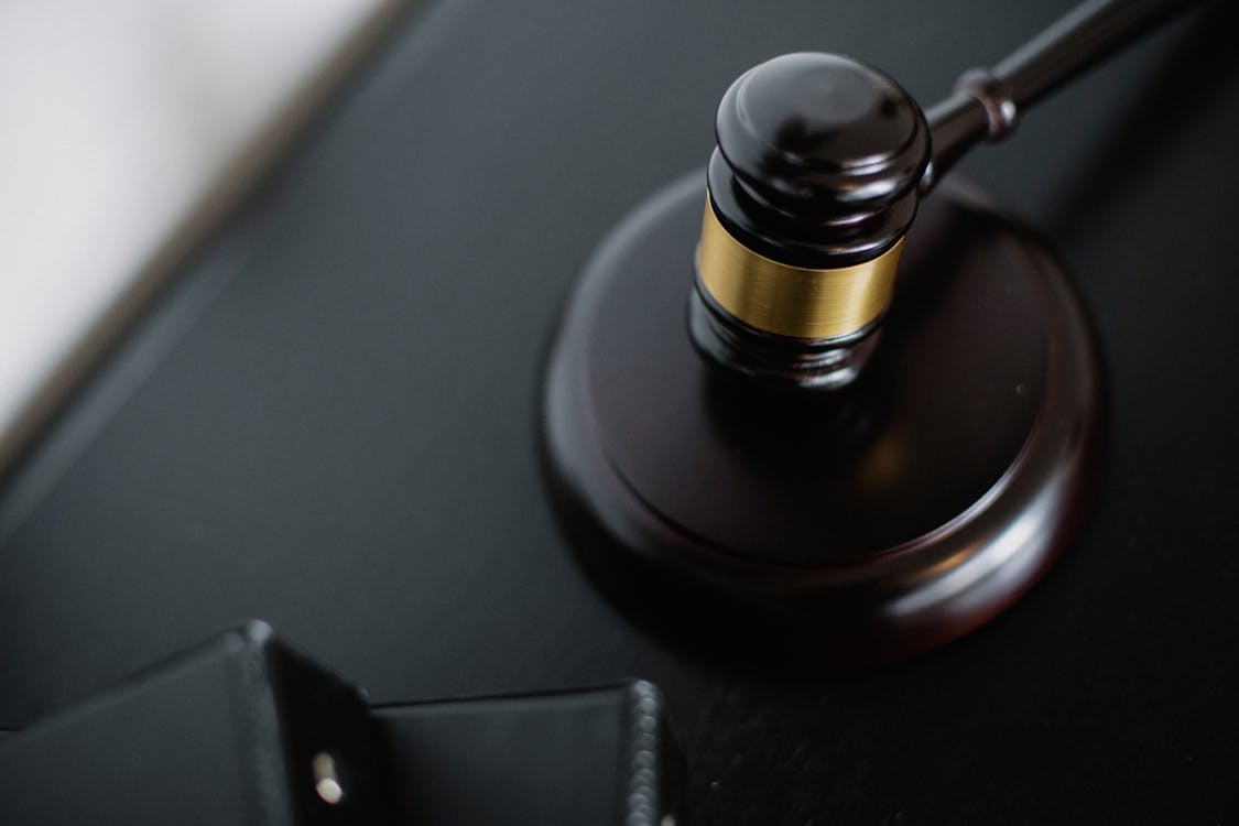 Gavel and scales representing New Jersey cannabis law and justice